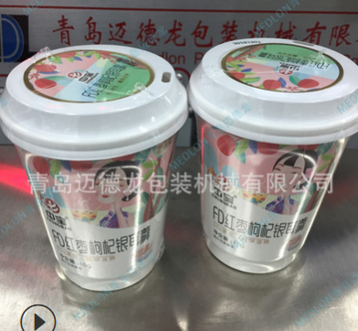 迈德龙厂家直供奶茶包装机 奶茶热收缩包装机 奶茶覆膜包装机设备图4