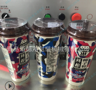 迈德龙厂家直供奶茶包装机 奶茶热收缩包装机 奶茶覆膜包装机设备图3