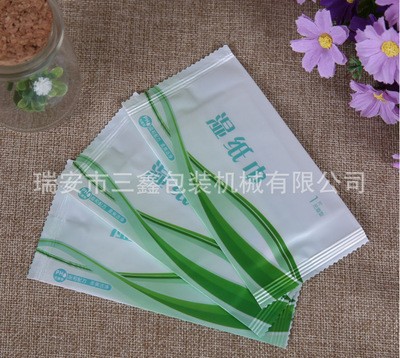 全自动高速单片湿巾包装机三边封湿巾机酒精消毒片湿巾机图3