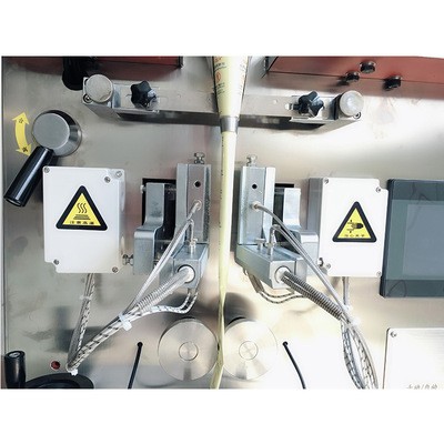 自主设计 新升级包装机 自动计量双物料脱氧剂收卷包装 专业定制图5