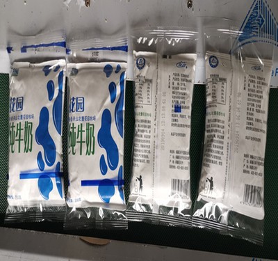 牛奶袋中袋包装机水牛奶冰袋奶袋中袋打包机墨轮打码机封口包装机图5