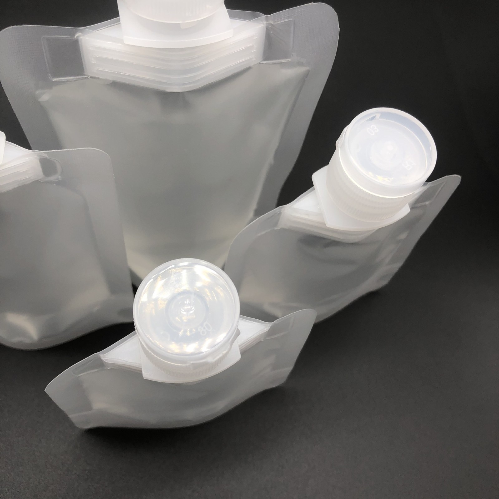 旅行乳液分装袋50ml100ml化妆品分装吸嘴袋 精油翻盖吸嘴袋分装袋图5