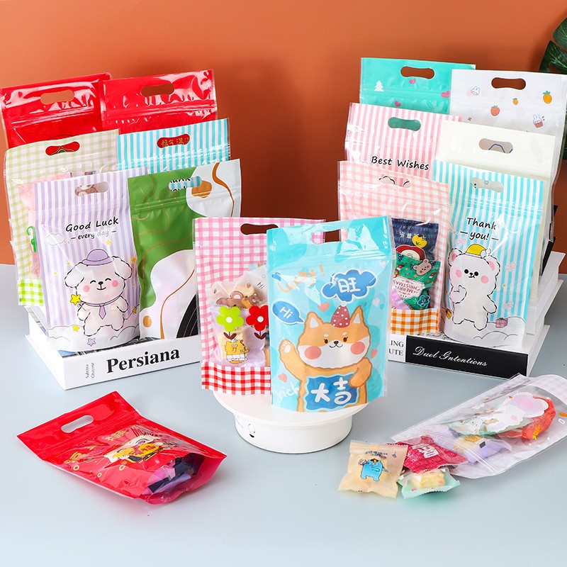2021年新款休闲食品包装袋可爱卡通自封袋新年喜庆糖果自立袋现货图1