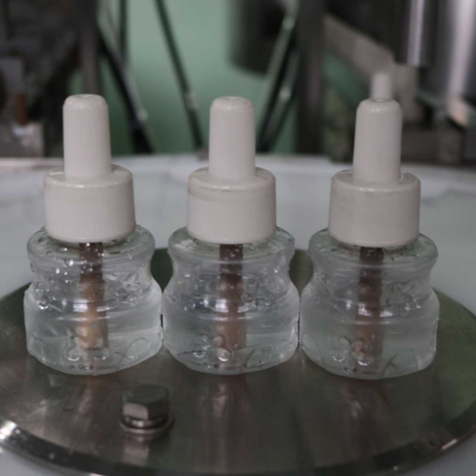 上海涛红蚊香液灌装加塞旋盖机 电热蚊香液灌装机图4