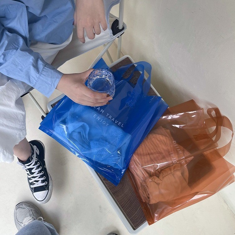 服装店透明手提袋购物包装袋定logo制童装袋子衣服打包 塑料袋批发图4